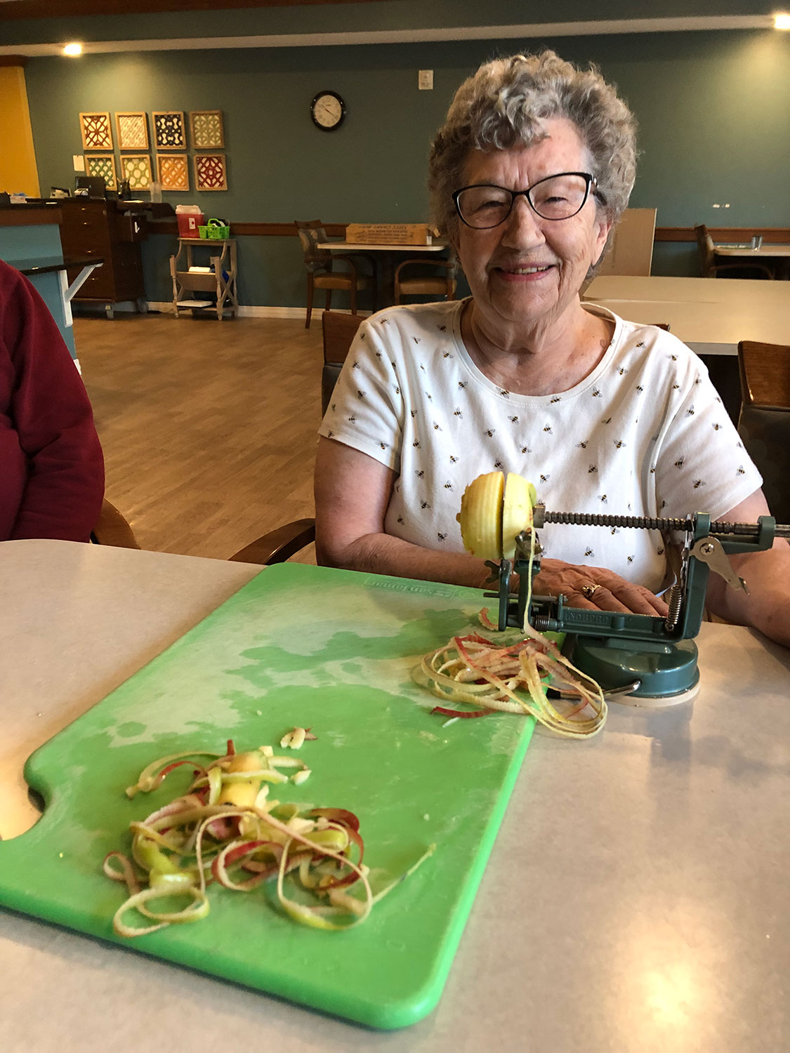 The Rosemount, resident peels apples